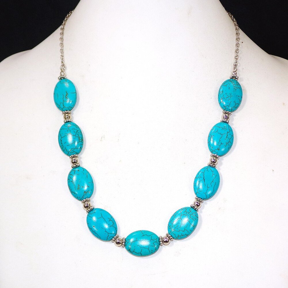 Turquoise stone necklace  with oval shape stones and small round silver beads